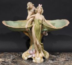 Royal Dux Art Nouveau centrepiece, modelled as scantily clad water nymphs flanked by lily pads, 39cm