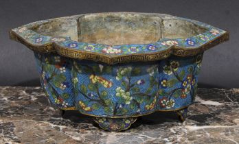 A Chinese cloisonne enamel lotus shaped cache pot, decorated with flowers and blossoming prunus,