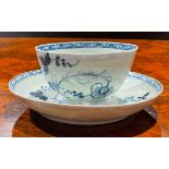 A Chaffers Liverpool Birds in Branches pattern tea bowl and saucer, decorated in underglaze blue,