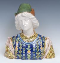 An Italian maiolica bust, in the manner of Angelo Minghetti, Bologna, depicting a Renaissance youth,