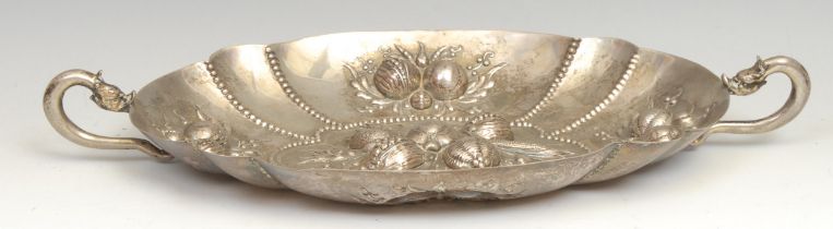 A Continental silver fluted oval fruit dish, in the 17th century taste, grotesque mask handles, 39cm