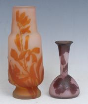 A Gallé style pâte de verre cameo glass vase, incised with orange leafy fronds on a salmon pink