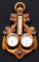 An early 20th century wall hanging combination aneroid barometer, thermometer and timepiece, of