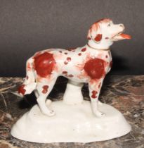 A 19th century Staffordshire model, of a panting spaniel, picked out in rust brown, gilt line