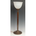 An Art Deco copper columnar table lamp, by Siemans, designed by Peter Behrens, frosted white glass