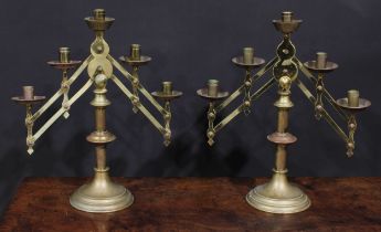 A pair of 19th century Gothic Revival brass adjustable ecclesiastical five light candelabra, 41cm