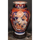 A Japanese ovoid vase, decorated in the Imari palette with birds, landscapes and floral motifs,