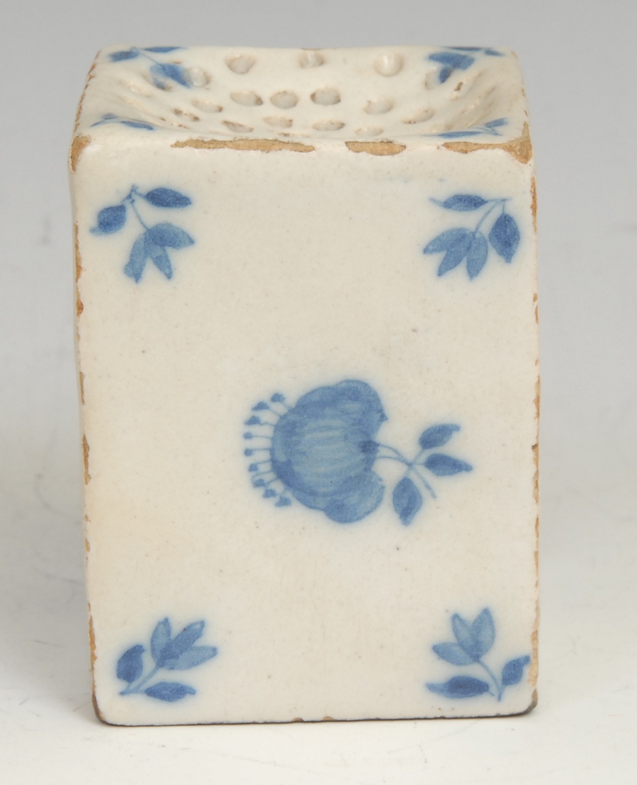 An 18th century Delft square pounce pot, painted in tones of blue with scattered floral sprigs, - Image 4 of 5