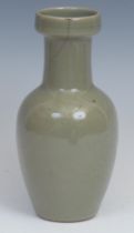 A Chinese celadon ovoid vase, incise moulded with a crane and chrysanthemums, 19.5cm high, blue seal