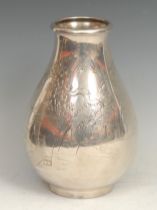 A Japanese silver ovoid vase, engraved with a pagoda in a monumental landscape, 19cm high, character