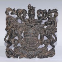 a 19th century cast iron Royal coat of arms, 31cm high, 28cm wide