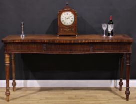 A 19th century Adam Revival campaign serpentine serving table, slightly oversailing crossbanded