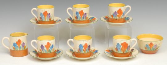 A Clarice Cliff Bizarre Crocus pattern coffee set, six coffee cans and saucers, cream jug and