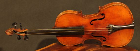 A violin, the two-piece back 36.5cm long excluding button, paper label printed Giovanni Paolo