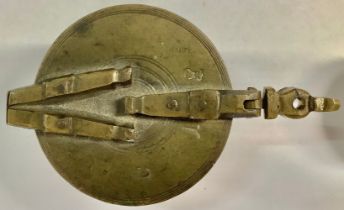 A set of early 19th century brass "Nuremberg" stacking weights, in hinged bucket shaped brass