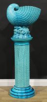 A Burmantofts faience turquoise glaze jardiniere and pedestal, as a nautilus shell on a naturalistic