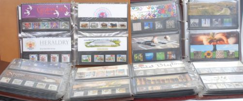 Stamps - QEII presentation pack collection in four binders, 1980's - 2000, f/v £300+