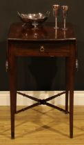 A George III mahogany butterfly Pembroke table, shaped top with fall leaves above a single frieze