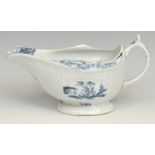 A Lowestoft Little Fisherman pattern strap fluted sauce boat, decorated in underglaze blue within