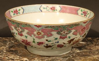 A Chinese famille rose circular bowl, painted in polychrome enamels with chyrsanthemums and