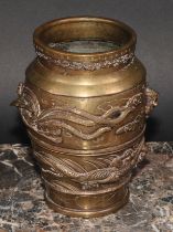 A Chinese bronze ovoid vase, cast and applied with dragons, 15.5cm high, early 20th century