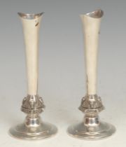 A pair of Elizabeth II silver specimen vases, each Gothic socle with wolf or fox masks, spreading