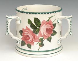 A large Bristol Pottery tyg, typically painted with red cabbage roses and green foliage, probably