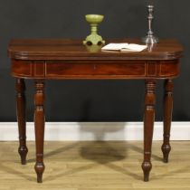 A 19th century mahogany tea table, hinged top with channelled edge above a frieze drawer, turned