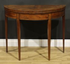 A George III mahogany demilune card table, hinged top enclosing a baize lined playing surface,