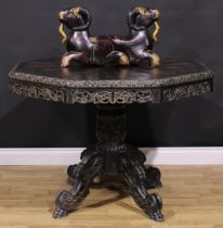 A 19th century Anglo-Indian ebony centre table, octagonal top with well-figured radiating veneers
