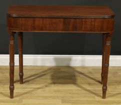A 19th century mahogany tea table, hinged top with reeded edge above a deep frieze, ring-turned