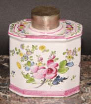 A 19th century Continental faience octagonal tea caddy and cover, painted with stylised flowers,