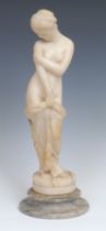 Grand Tour School, an alabaster figure, Venus, after the Antique, waisted circular base, 41cm high