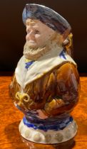 A late 19th century Wemyss pottery character jug, moulded as the Jolly Sailor, decorated in