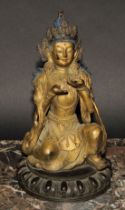 Chinese School (19th century), a gilt and dark patinated bronze, Bodhisattva Tara, kneeling, lotus