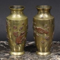 A pair of Japanese bronze and mixed metal ovoid vases, applied with birds and blossoming prunus,