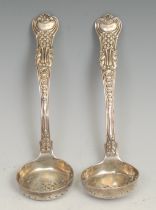 A pair of Victorian silver Coburg pattern sifter spoons, of substantial gauge, 16.5cm long, George W