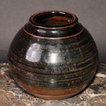 Margaret Leach (b.1918) - a stoneware globular reeded vase, tenmoku glaze, 15cm high, impressed mark
