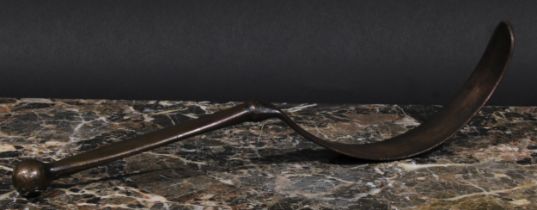 A 19th century bronze cream skimmer, 37cm long
