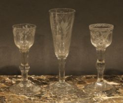 A George II drinking glass, the bowl etched with stylised flowers, knopped stem, domed folded