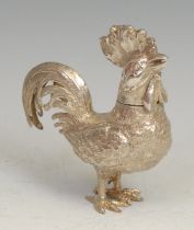 A Continental silver novelty condiment canister, as a cockerel, articulated wings, 9cm long,