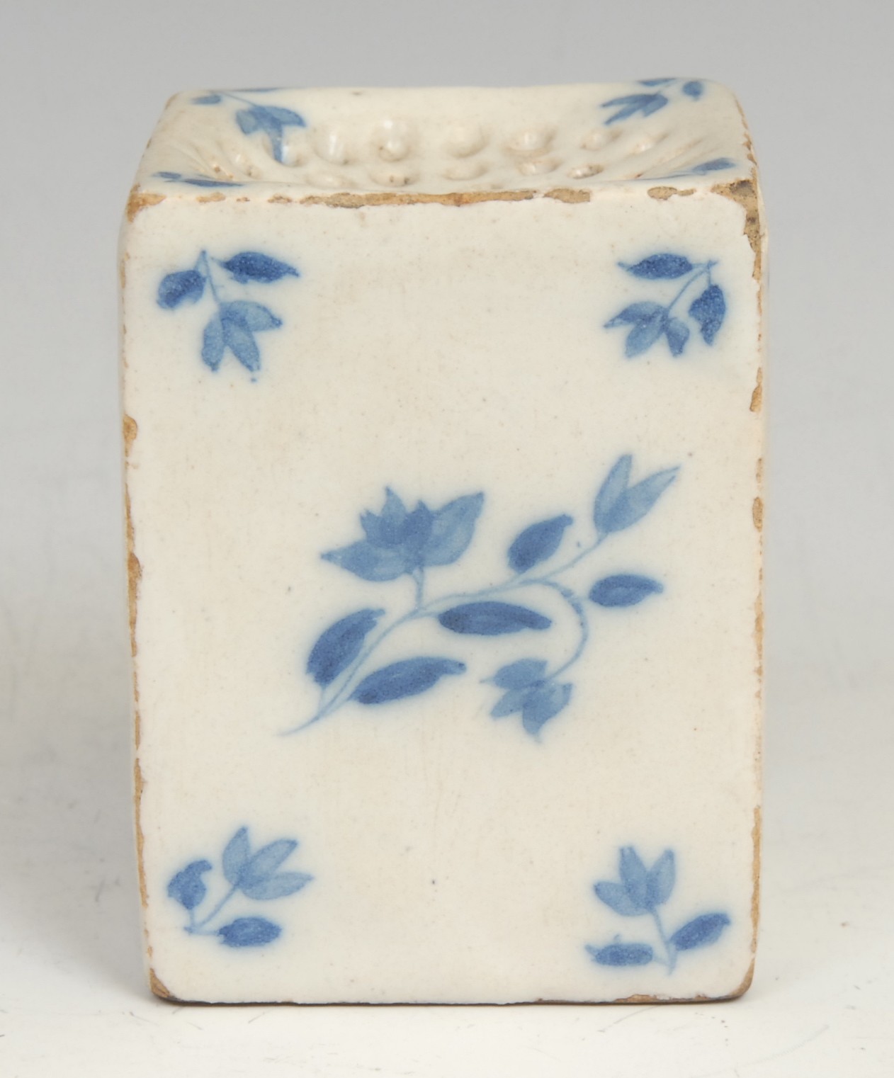 An 18th century Delft square pounce pot, painted in tones of blue with scattered floral sprigs, - Image 2 of 5