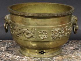A Chinese gilt bronze censer, cast and applied with a band of dragons and clouds, mask handles to