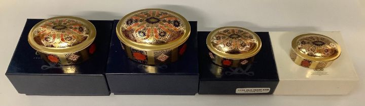 A set of four Royal Crown Derby 1128 pattern graduated oval trinket dishes and covers, solid gold
