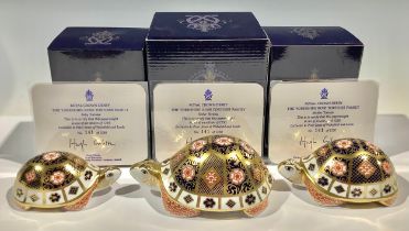 A Royal Crown Derby paperweight group, The Yorkshire Rose Tortoise Family, comprising, Father,