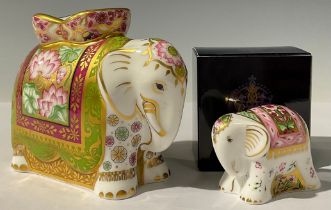 A pair of Royal Crown Derby paperweights, Mother Indian Elephant and Baby Indian Elephant, boxed,