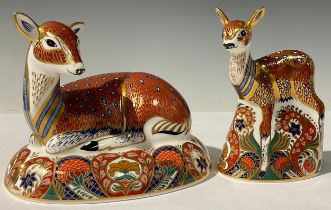 A pair of Royal Crown Derby paperweights, Roe Deer and Fawn, designed exclusively for the Royal