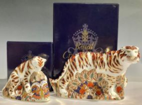 A Royal Crown Derby paperweight, Bengal Tiger, gold stopper, 21cm long, printed mark in red,