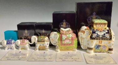 A Royal Crown Derby paperweight family group, comprising Raj Father Elephant, Govier's of Sidmouth