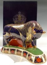 A Royal Crown Derby paperweight, Bull, gold stopper, 20cm wide, printed mark in red, certificate,